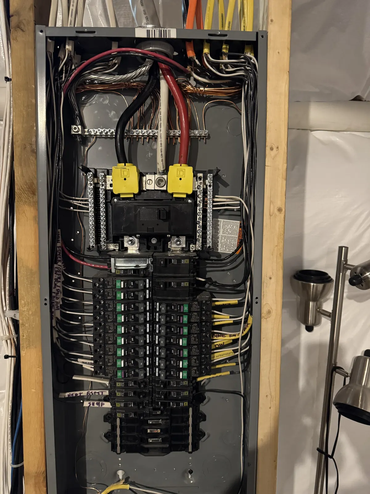 JLC Electrical Contractors LLC Electrical panel upgrade with neatly dressed wiring by JLC Electrical Contractors