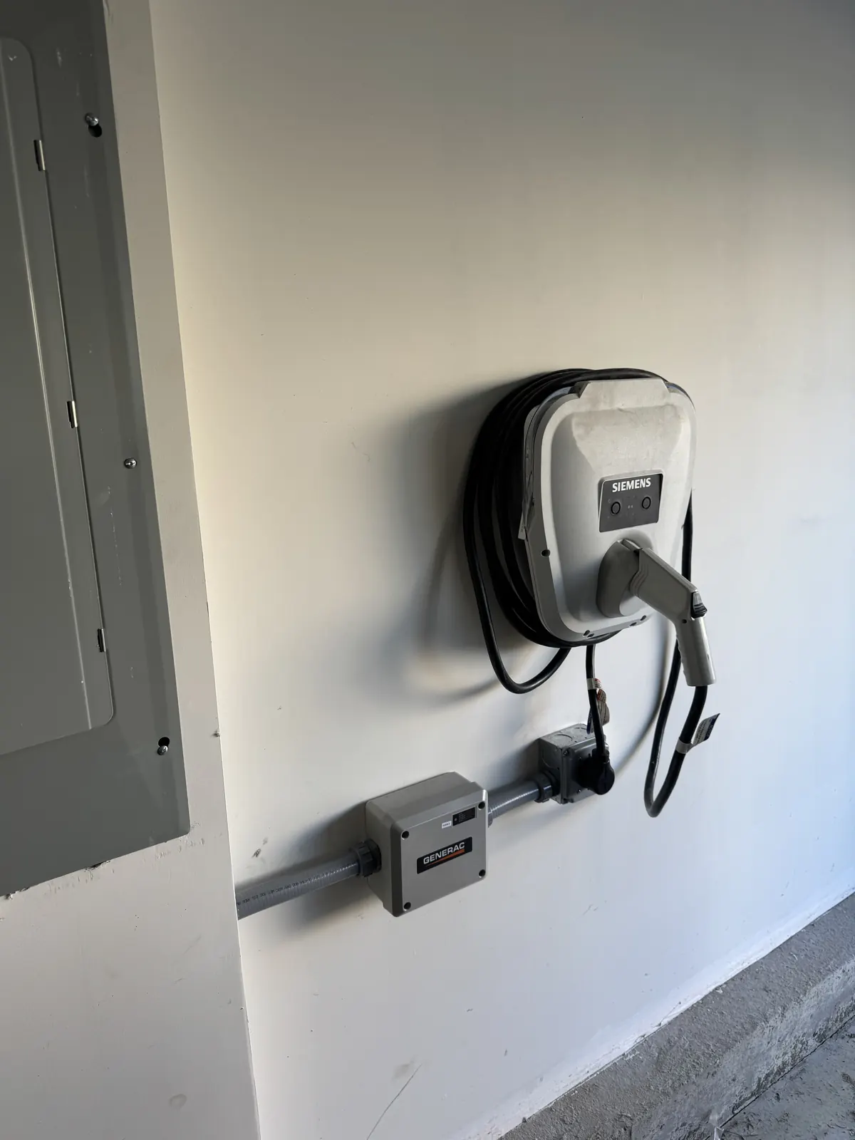JLC Electrical Contractors LLC Level 2 EV charger wall-mounted and wired by JLC Electrical Contractors