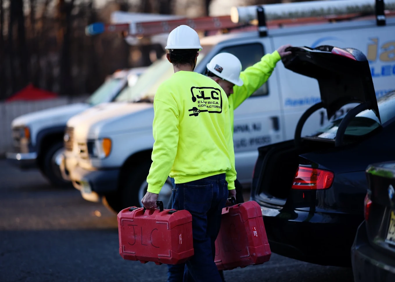 JLC electricians arriving at a job site with their tools JLC electricians arriving at a job site with their tools